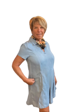 Load image into Gallery viewer, Cheryl wearing a light blue dress with a floral scarf on a transparent background.