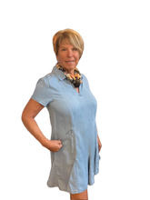 Load image into Gallery viewer, Woman wearing a light blue dress with a floral scarf on a transparent background
