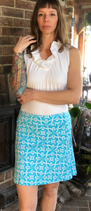 LuluB Pull On Skort with Side Zip at the Leg. Fabric contains SPF 50+ and a Coolant.